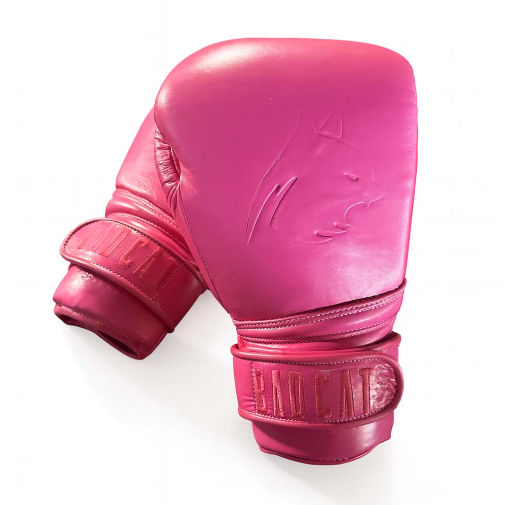 Pink boxing glove on a white background