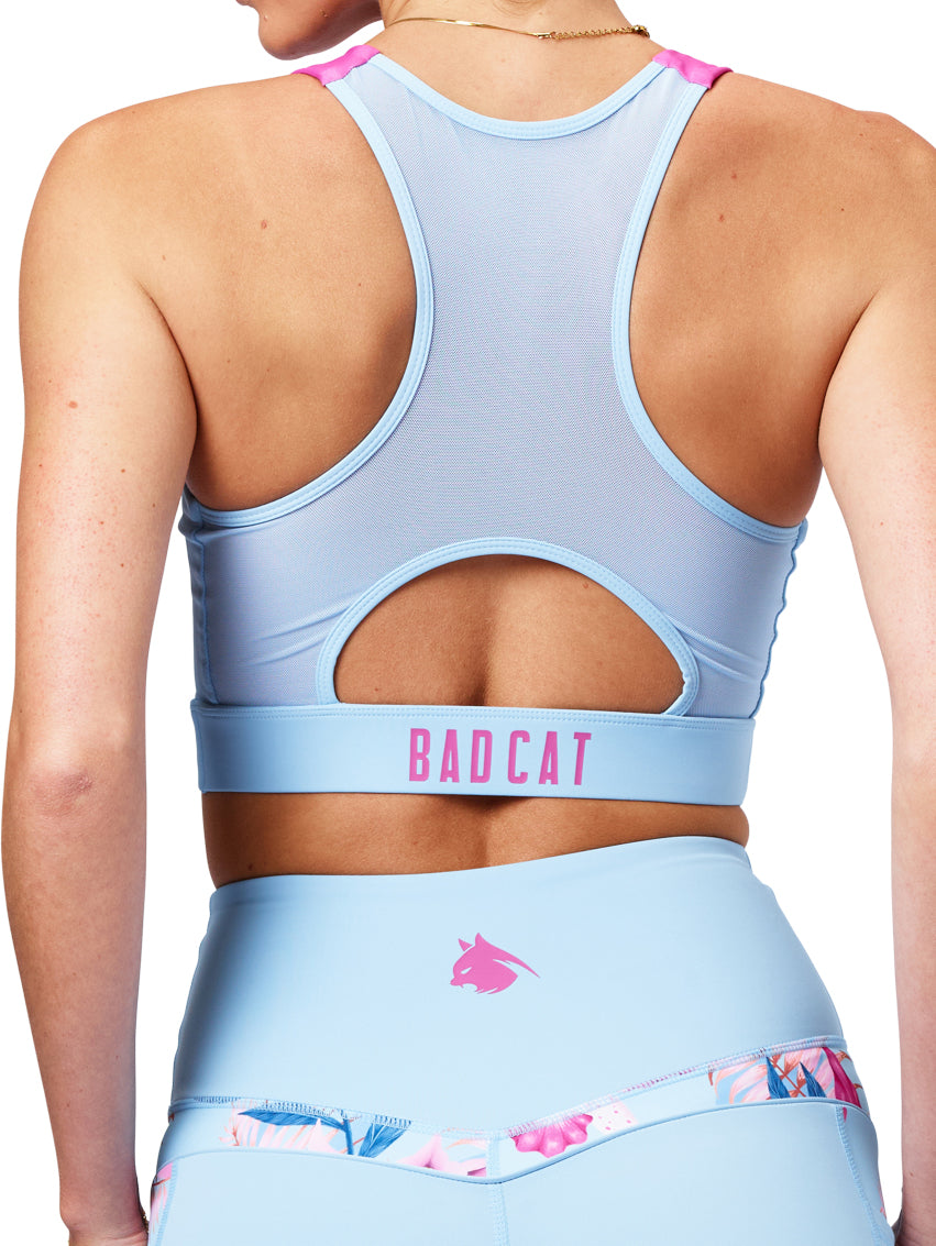 Light blue sports bra and shorts with 'BAD CAT' branding on a white background